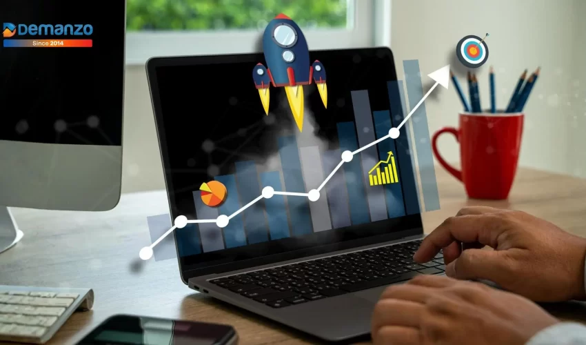 Laptop showing business growth and ROI improvement using CRO strategies by Demanzo